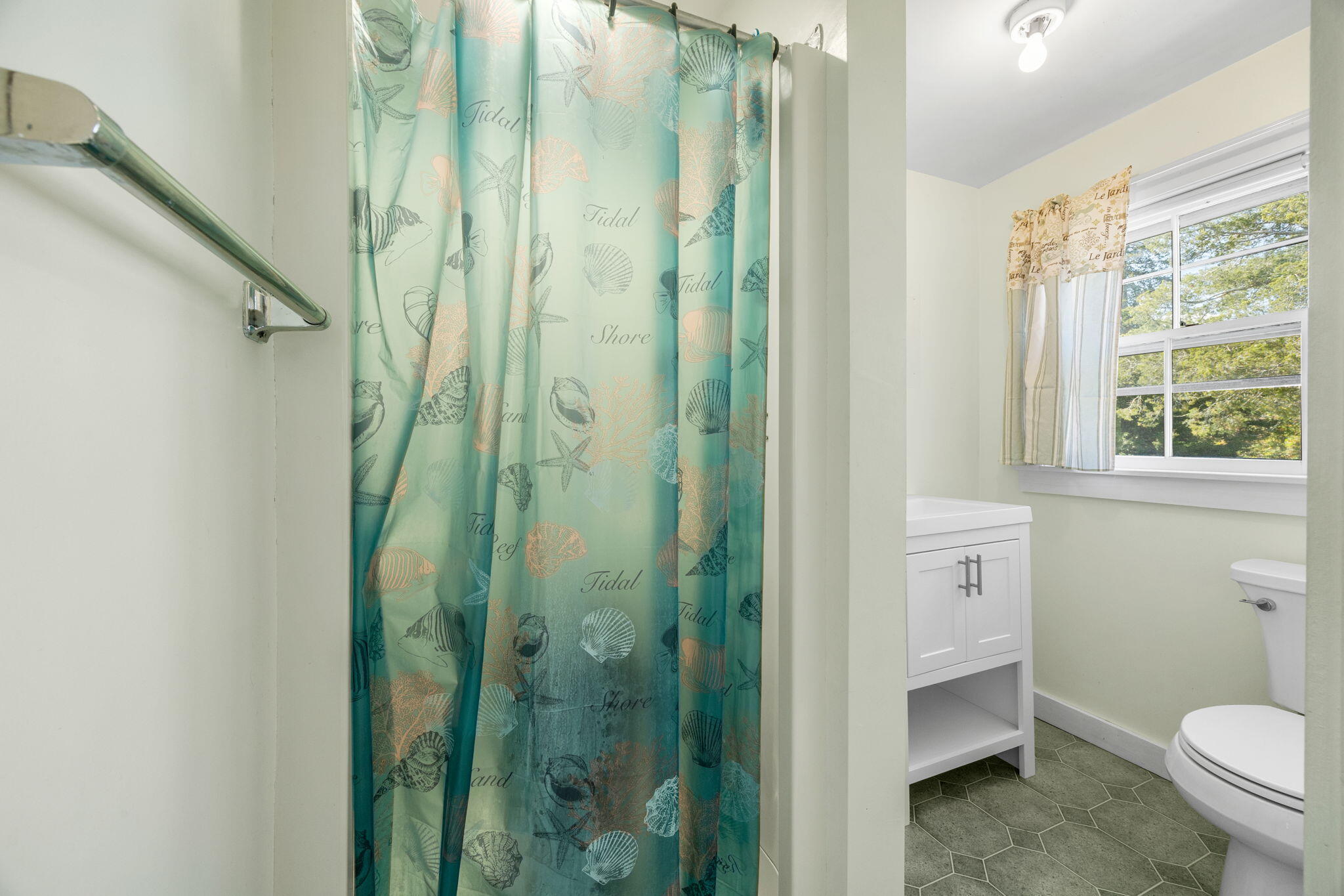 9 Harrison Avenue Buzzards Bay, MA 02532 - Photo 17 of 47 a bathroom with a shower and a toilet