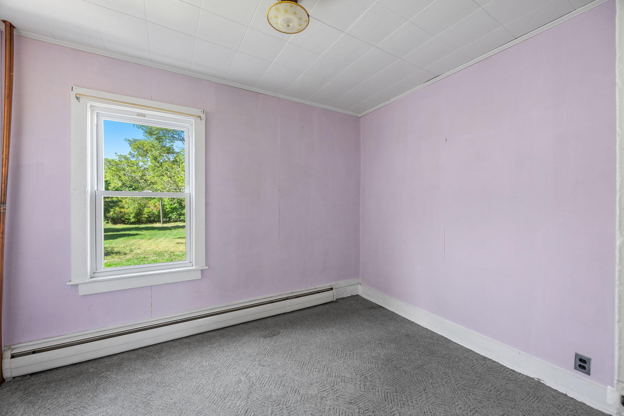 9 Harrison Avenue Buzzards Bay, MA 02532 - Photo 20 of 47 an empty room with a window