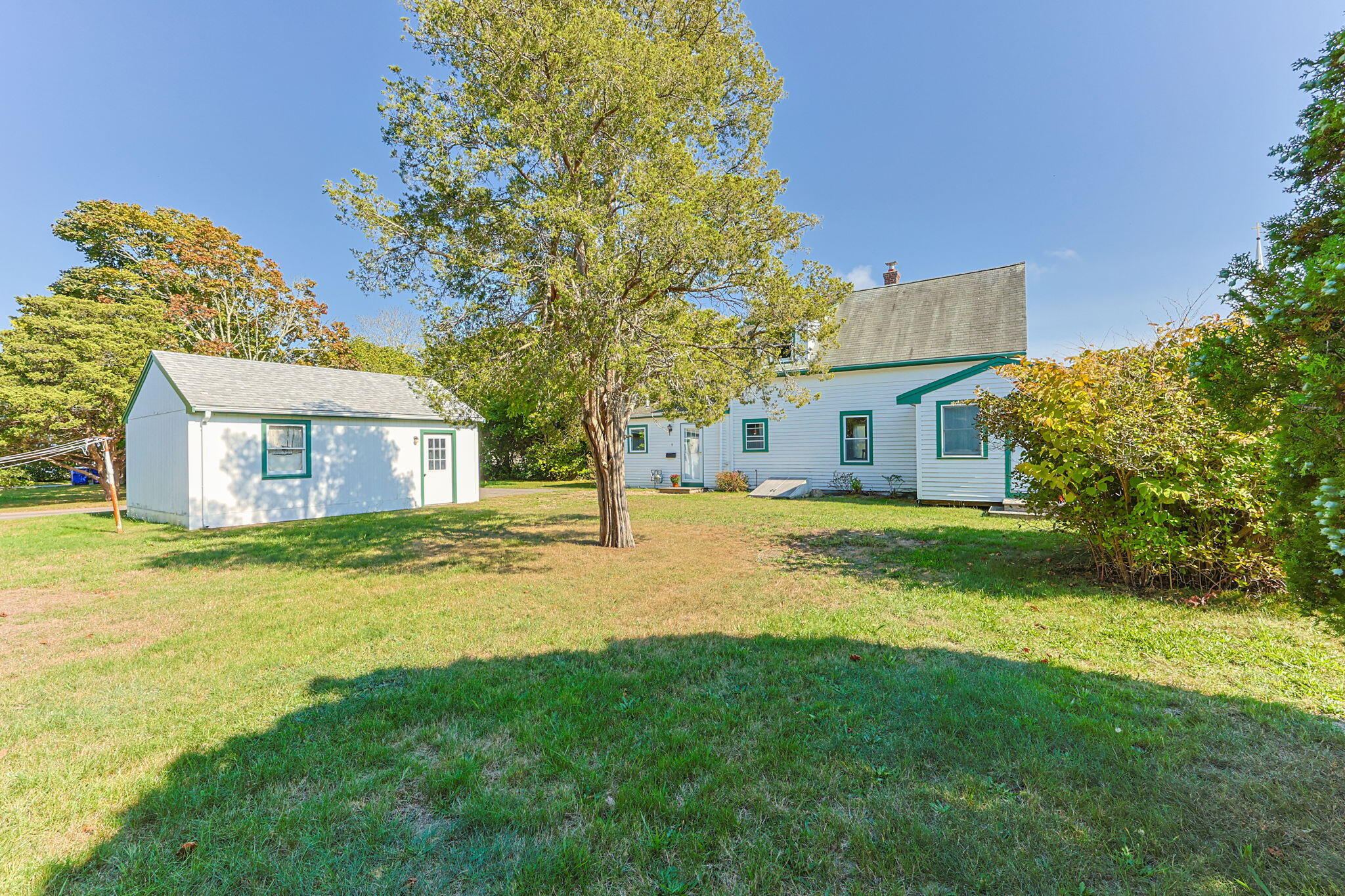9 Harrison Avenue Buzzards Bay, MA 02532 - Photo 2 of 47 a view of a house with a yard