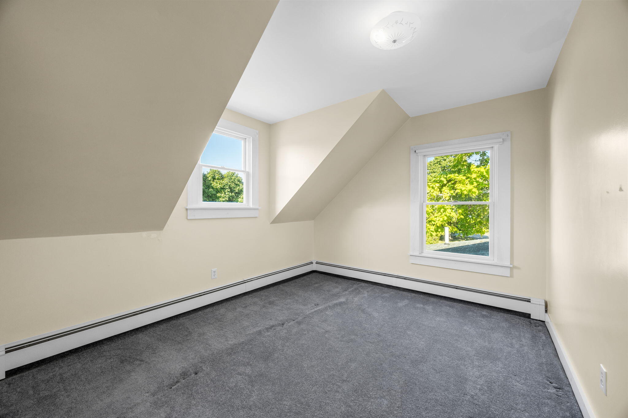 9 Harrison Avenue Buzzards Bay, MA 02532 - Photo 36 of 47 an empty room with windows