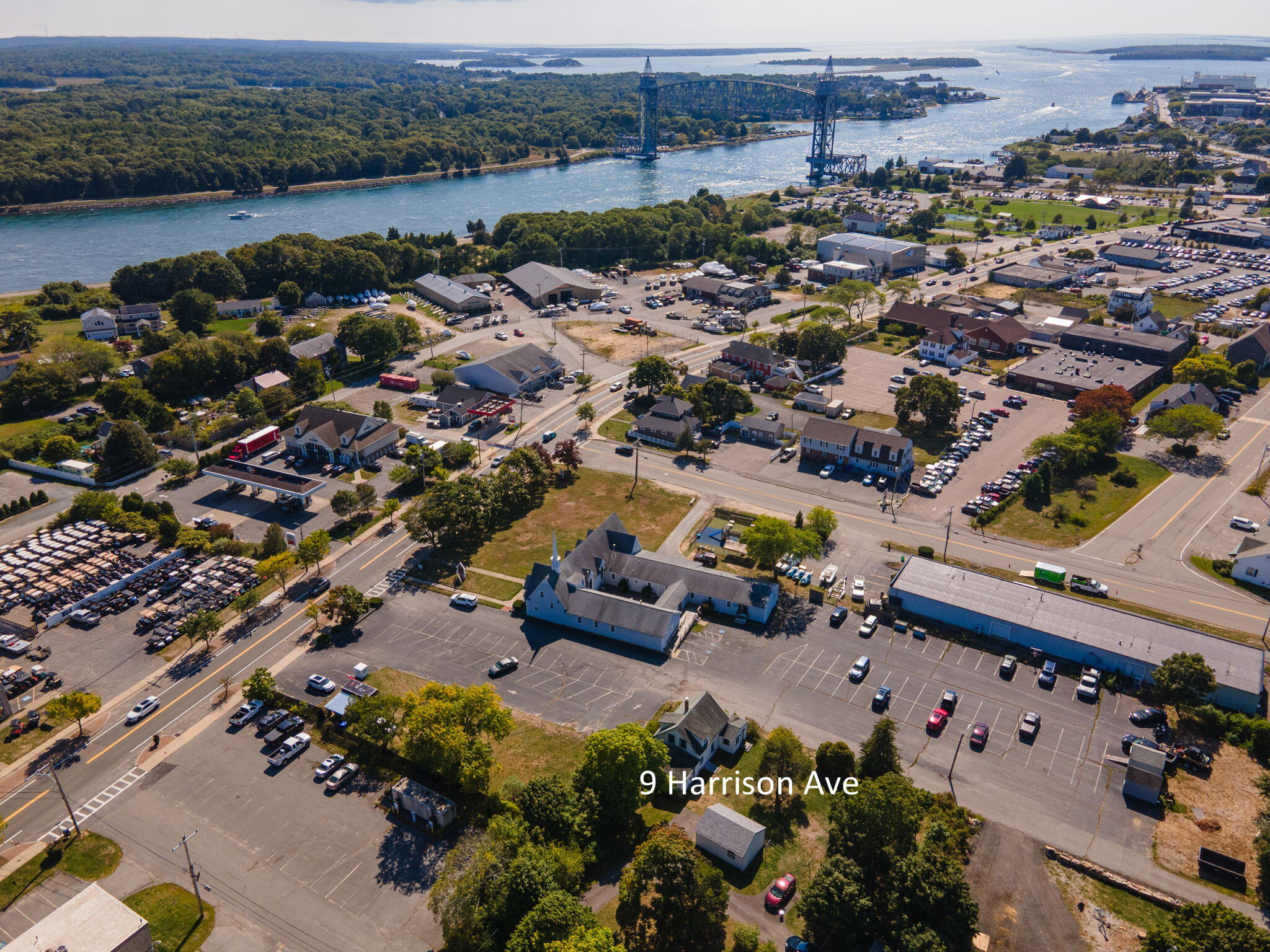 9 Harrison Avenue Buzzards Bay, MA 02532 - Photo 4 of 47 an aerial view of lake and residential houses with outdoor space