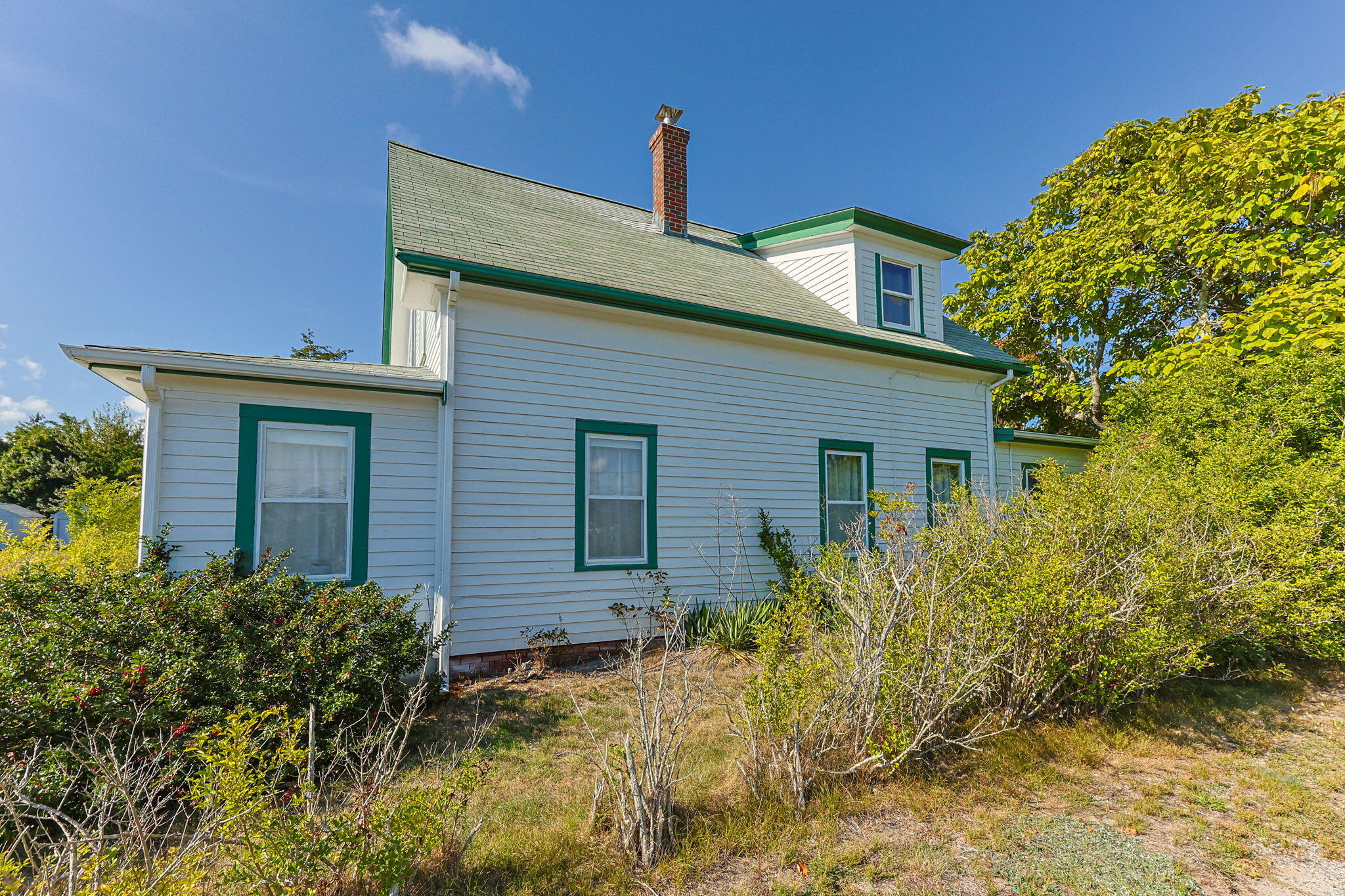 9 Harrison Avenue Buzzards Bay, MA 02532 - Photo 7 of 47 front view of a house with a yard