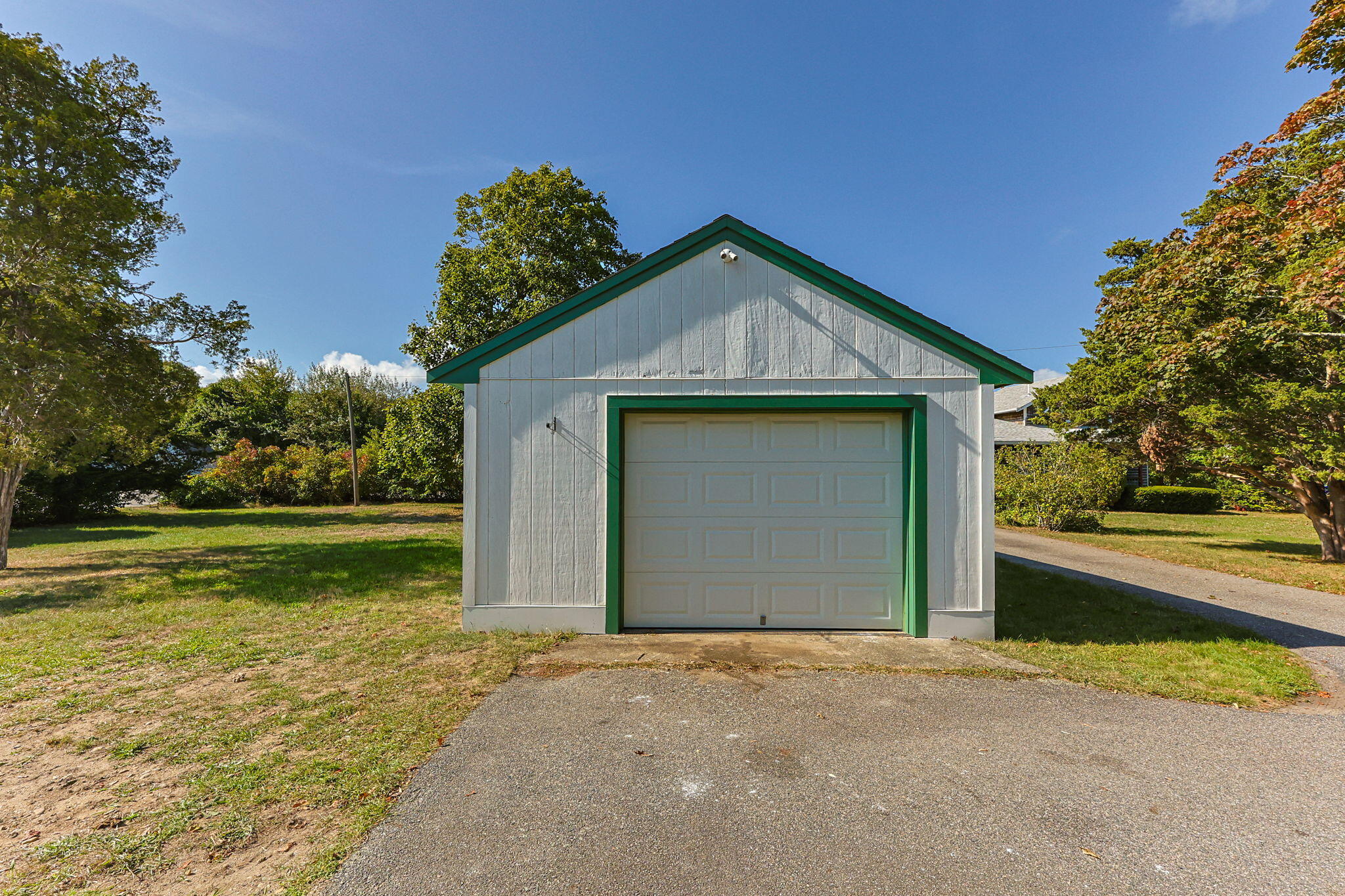 9 Harrison Avenue Buzzards Bay, MA 02532 - Photo 10 of 47 a front view of a house with garden