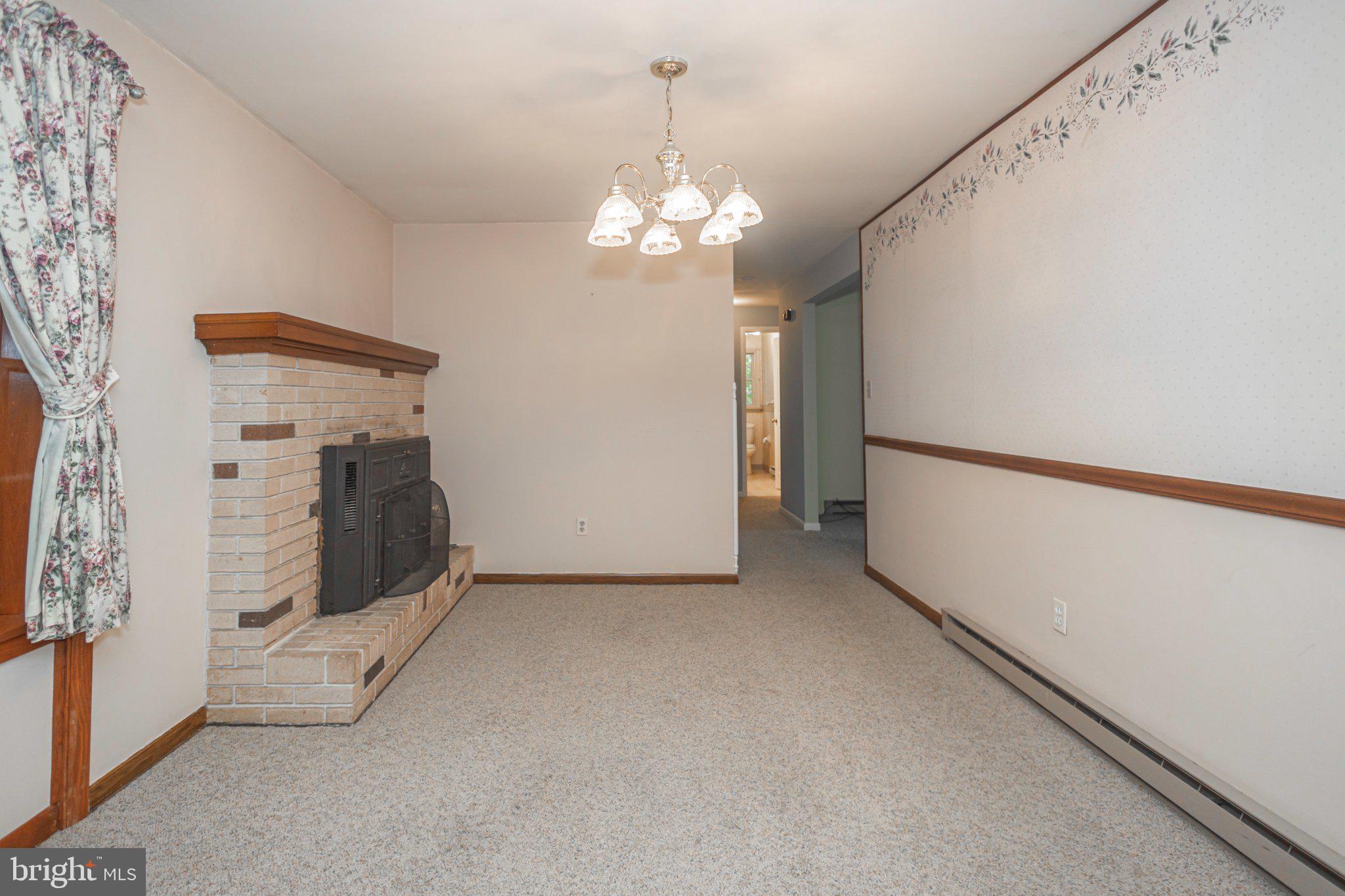 130 Webber Road Telford, PA 18969 - Photo 19 of 52 Dining room with fireplace.