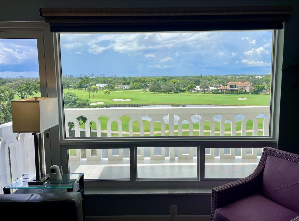 2500 Northeast 48th Lane, Unit 605 Fort Lauderdale, FL 33308 - Photo 23 of 32 a view of a room with mountain view and wooden floor