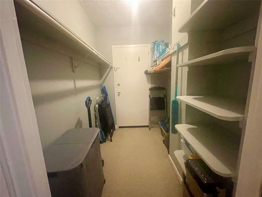 2500 Northeast 48th Lane, Unit 605 Fort Lauderdale, FL 33308 - Photo 9 of 32 a view of walk in closet