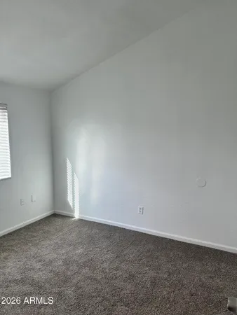 an empty room with an entryway