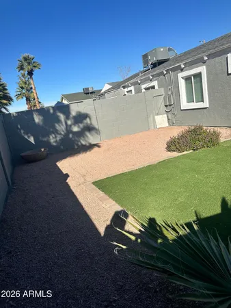 a view of a backyard with a garden