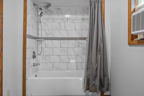 a bathroom with a bathtub