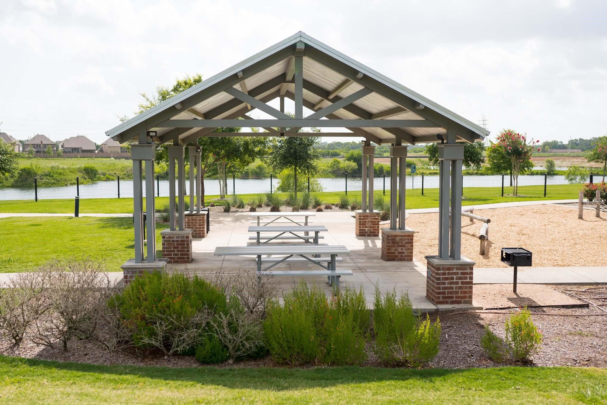 19515 Old Galveston Road Webster, TX 77598 - Photo 4 of 8 a view of a swimming pool with a patio
