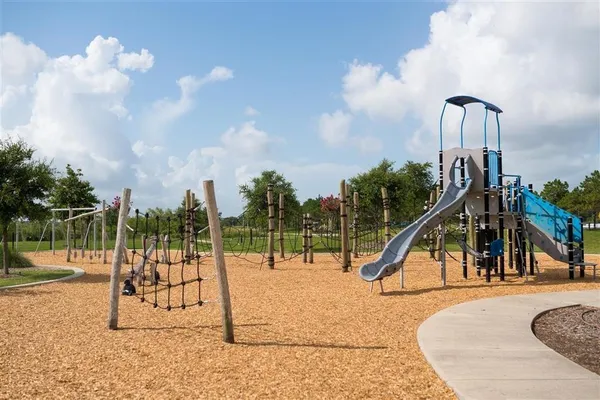 a view of a park with swings