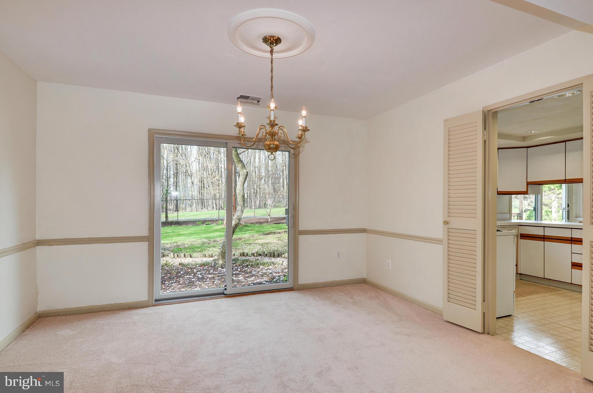 5514 Dunsmore Road Alexandria, VA 22315 - Photo 7 of 30 Sunny Dining Room with New Sliding Glass Doors