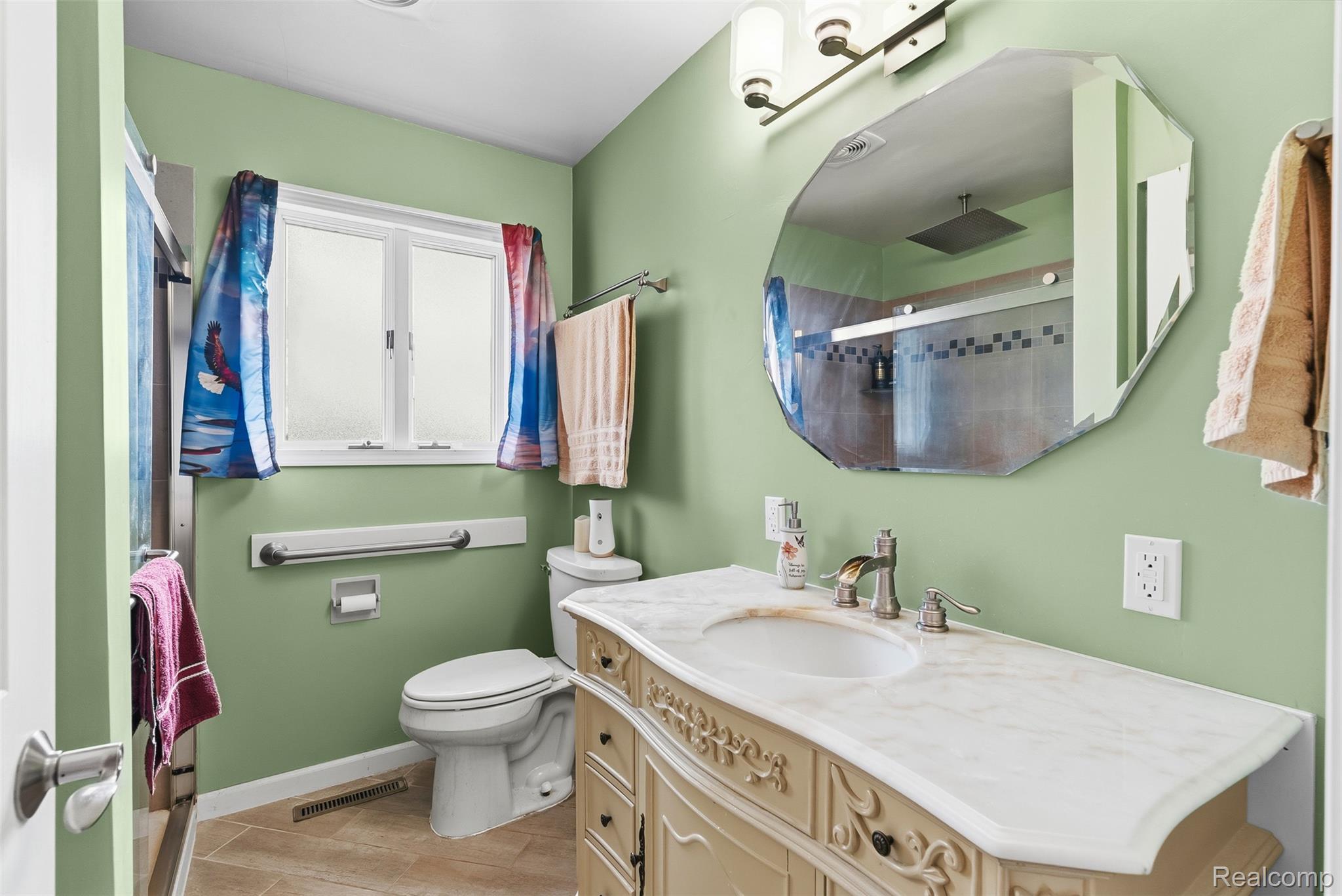 2227 North Graf Road Caro, MI 48723 - Photo 26 of 51 Decorative vanity with a single basin, stone countertop, and brushed nickel fixtures