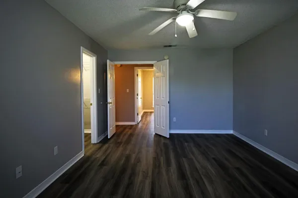 a view of storage and utility room with closet