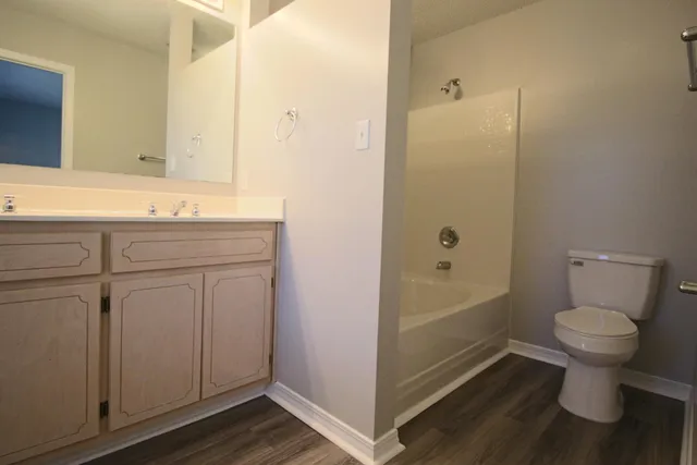 a view of entryway with wooden floor