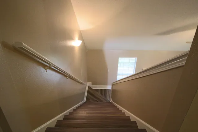 a view of a livingroom with wooden floor