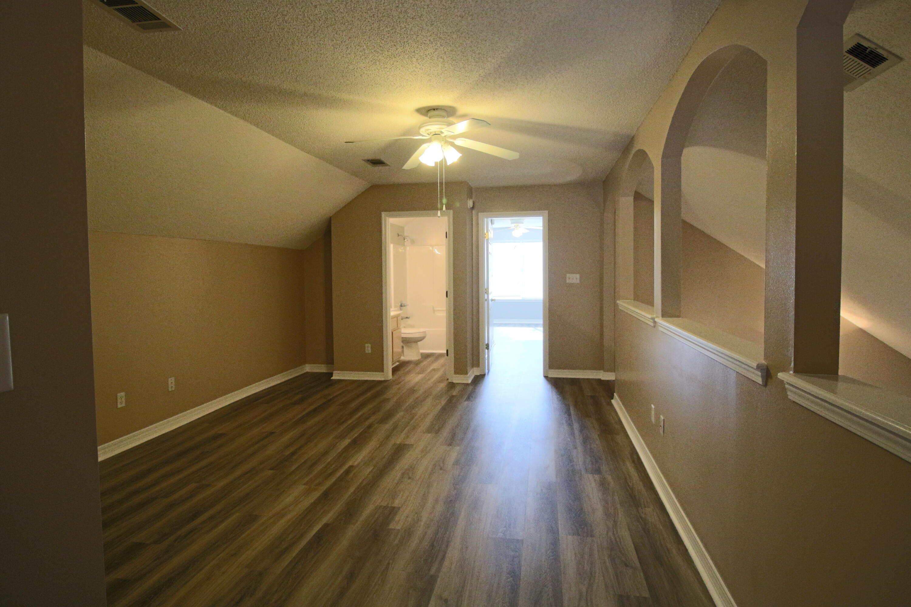 414 Whirlaway Court Crestview, FL 32539 - Photo 35 of 42 a view of gallery with wooden floor