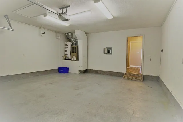 a view of room with wooden floor