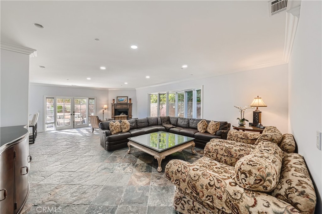 371 22nd Street Costa Mesa, CA 92627 - Photo 12 of 51 a living room with furniture and a wooden floor