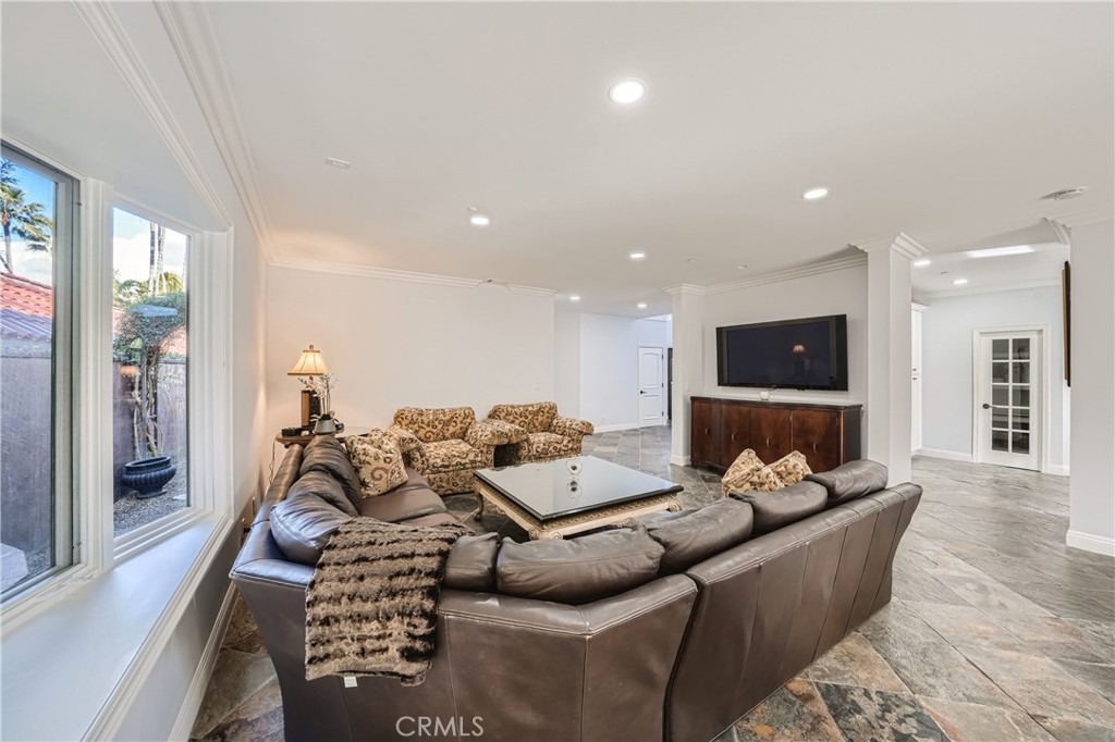 371 22nd Street Costa Mesa, CA 92627 - Photo 13 of 51 a living room with furniture and a flat screen tv