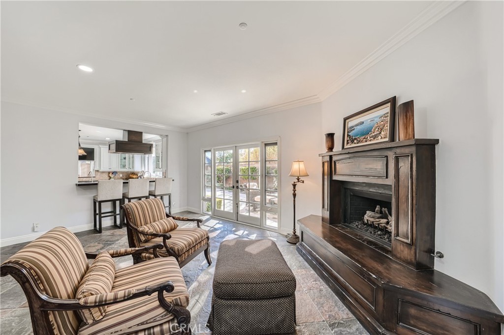 371 22nd Street Costa Mesa, CA 92627 - Photo 14 of 51 a living room with furniture fireplace and flat screen tv