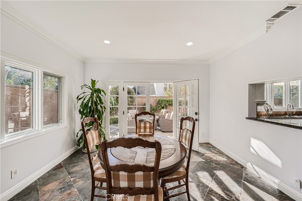 371 22nd Street Costa Mesa, CA 92627 - Photo 15 of 51 a view of a dining room with furniture and window