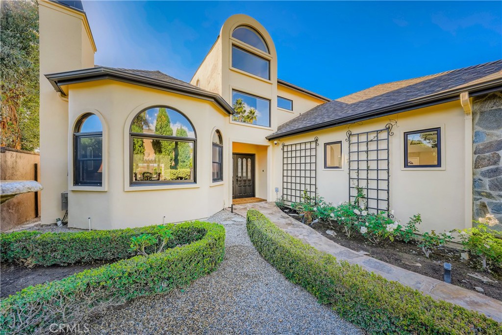 371 22nd Street Costa Mesa, CA 92627 - Photo 2 of 51 a front view of a house with a yard