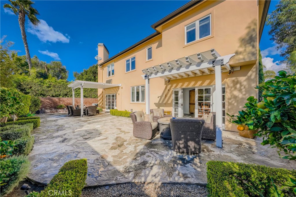 371 22nd Street Costa Mesa, CA 92627 - Photo 23 of 51 a view of a house with backyard and sitting area