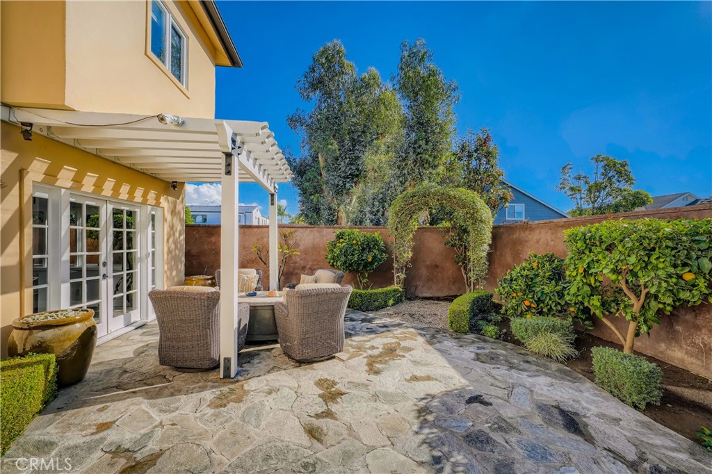 371 22nd Street Costa Mesa, CA 92627 - Photo 24 of 51 a view of a patio with couches and potted plants