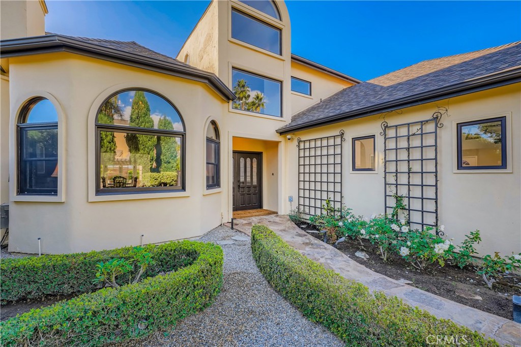 371 22nd Street Costa Mesa, CA 92627 - Photo 29 of 51 a front view of a house having yard