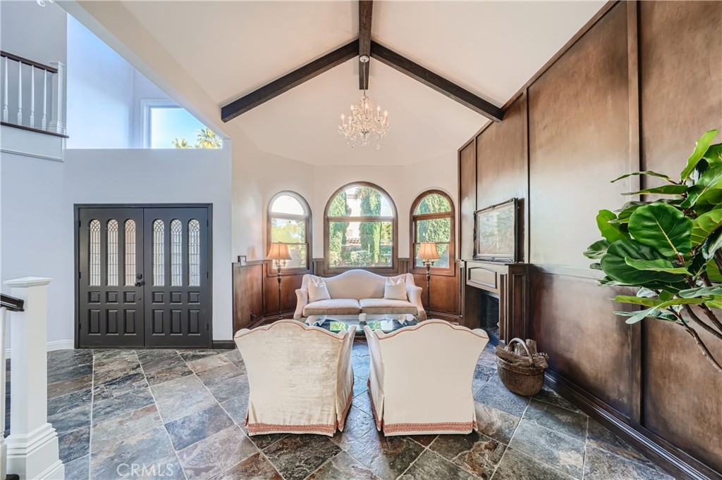 371 22nd Street Costa Mesa, CA 92627 - Photo 3 of 51 a view of living room filled with furniture and flower pot