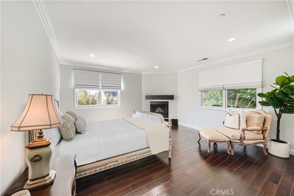 371 22nd Street Costa Mesa, CA 92627 - Photo 31 of 51 a bedroom with a bed and large windows