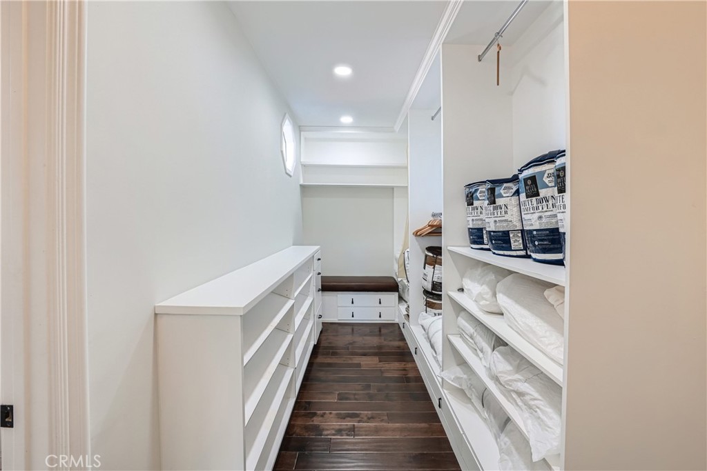 371 22nd Street Costa Mesa, CA 92627 - Photo 35 of 51 a view of a hallway with wooden floor and staircase