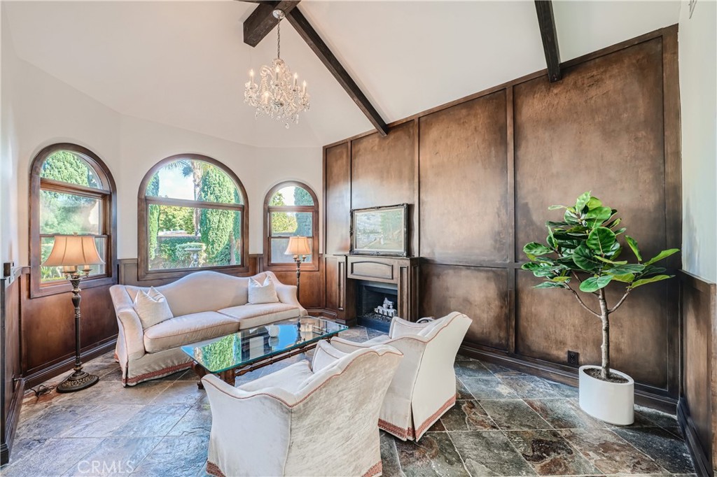 371 22nd Street Costa Mesa, CA 92627 - Photo 4 of 51 a living room with furniture fireplace and potted plants