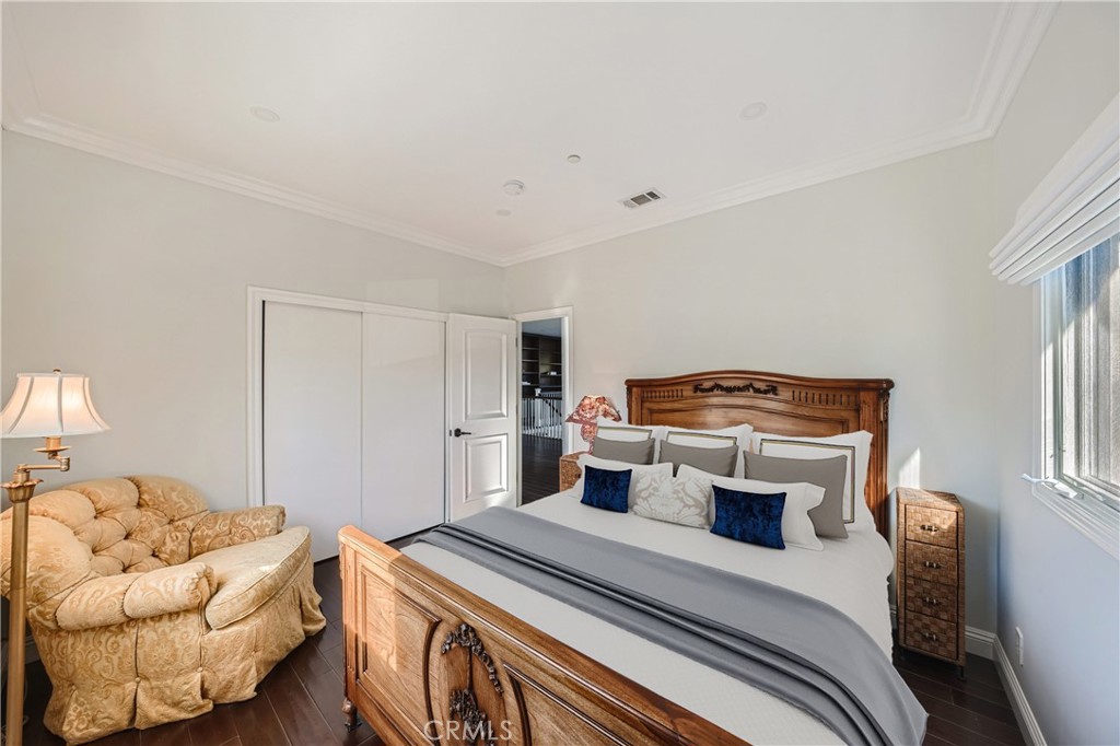 371 22nd Street Costa Mesa, CA 92627 - Photo 41 of 51 a bedroom with a bed and a couch