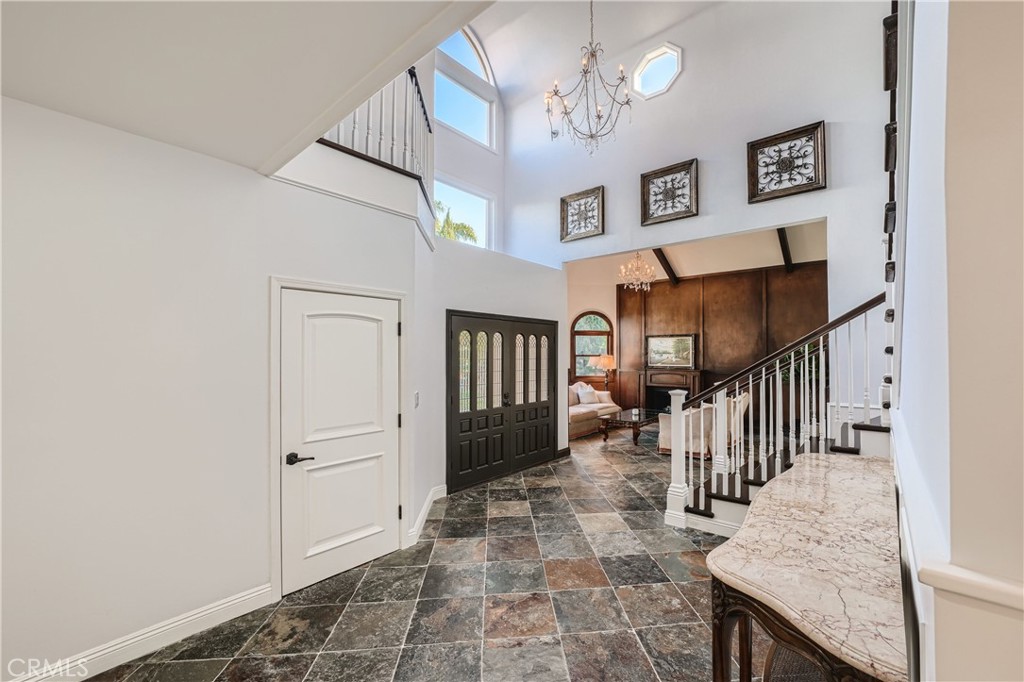 371 22nd Street Costa Mesa, CA 92627 - Photo 6 of 51 a view of entryway livingroom and hallway with wooden floor