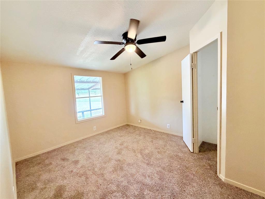 9721 Limestone Joshua, TX 76058 - Photo 28 of 36 a view of empty room with ceiling fan