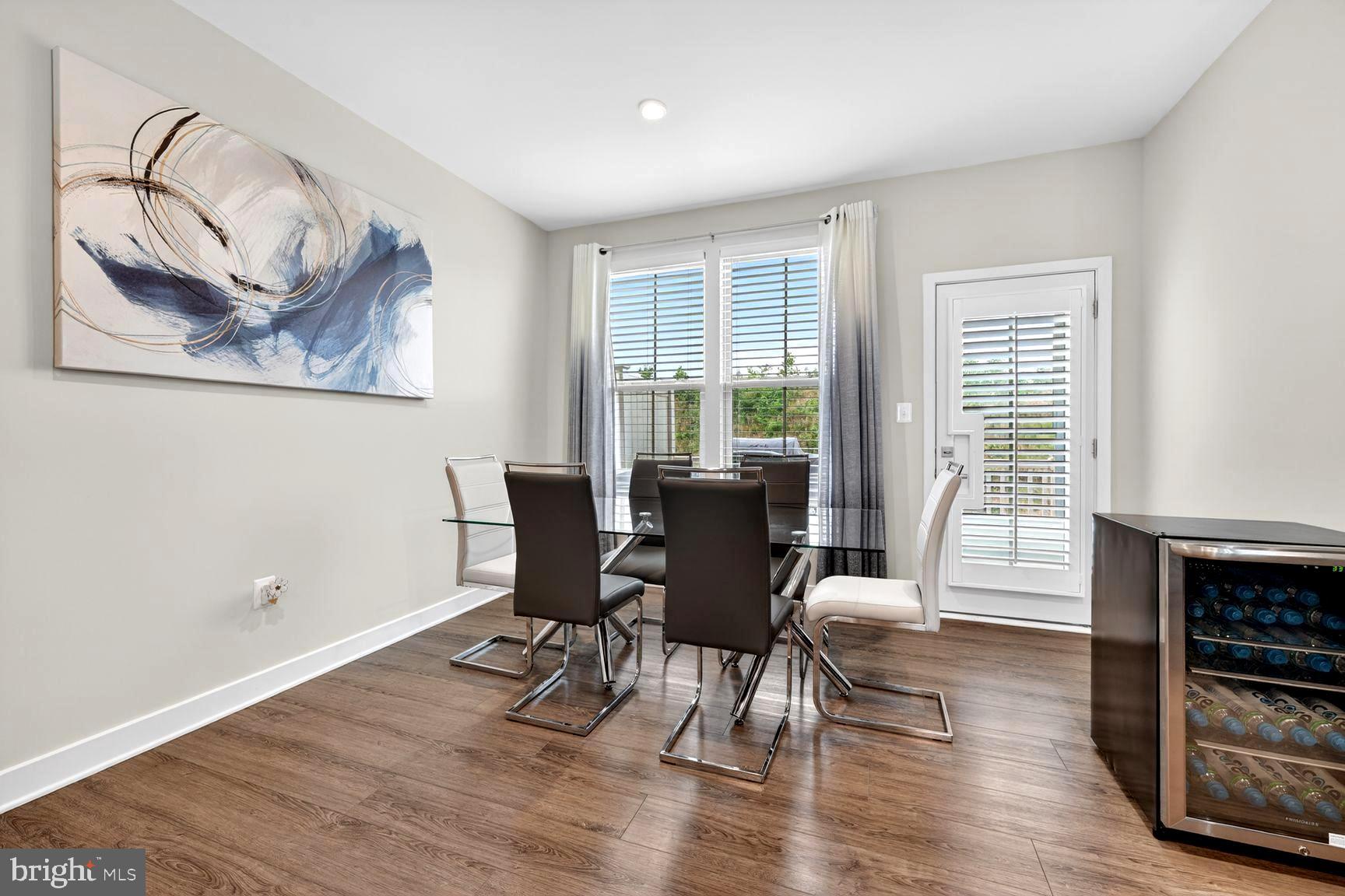 14963 Ring House Road, Unit D Brandywine, MD 20613 - Photo 6 of 31 FORMAL DINING TRANSITIONS TO ENTERTAINMENT DECK