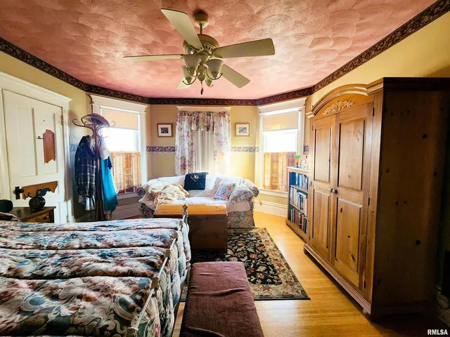 a very nice looking dining room with a large window