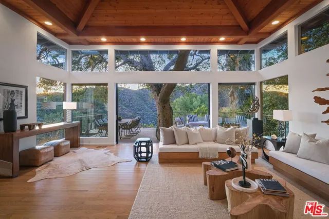 a view of balcony with furniture