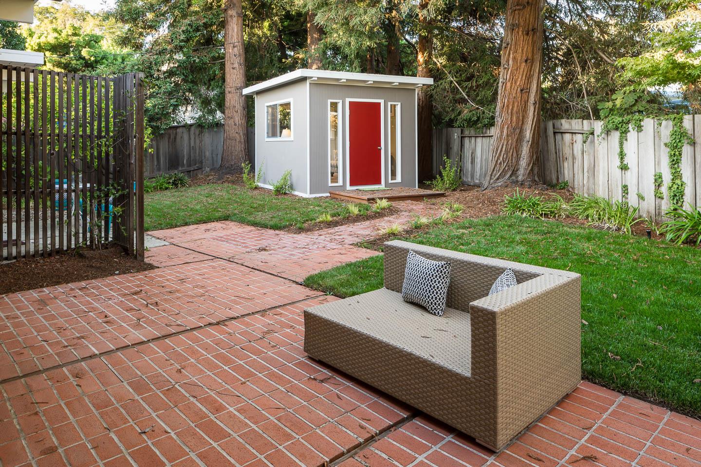 3441 Thomas Drive Palo Alto, CA 94303 - Photo 12 of 14 a view of a house with backyard and garden