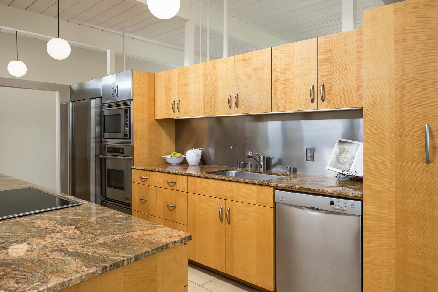 3441 Thomas Drive Palo Alto, CA 94303 - Photo 3 of 14 a kitchen with granite countertop a sink a stove and refrigerator