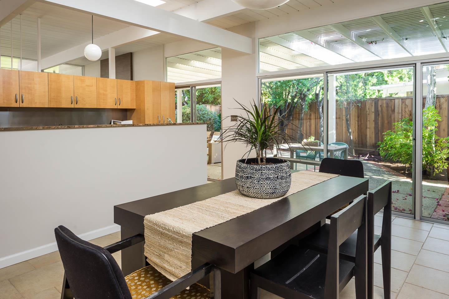 3441 Thomas Drive Palo Alto, CA 94303 - Photo 4 of 14 a view of a dining room with furniture window and outside view
