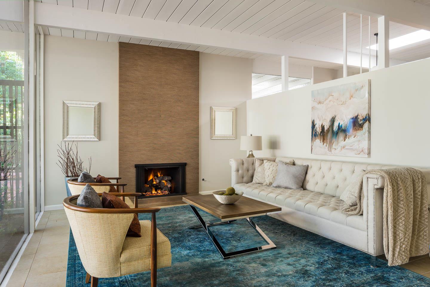 3441 Thomas Drive Palo Alto, CA 94303 - Photo 5 of 14 a living room with furniture and a fireplace