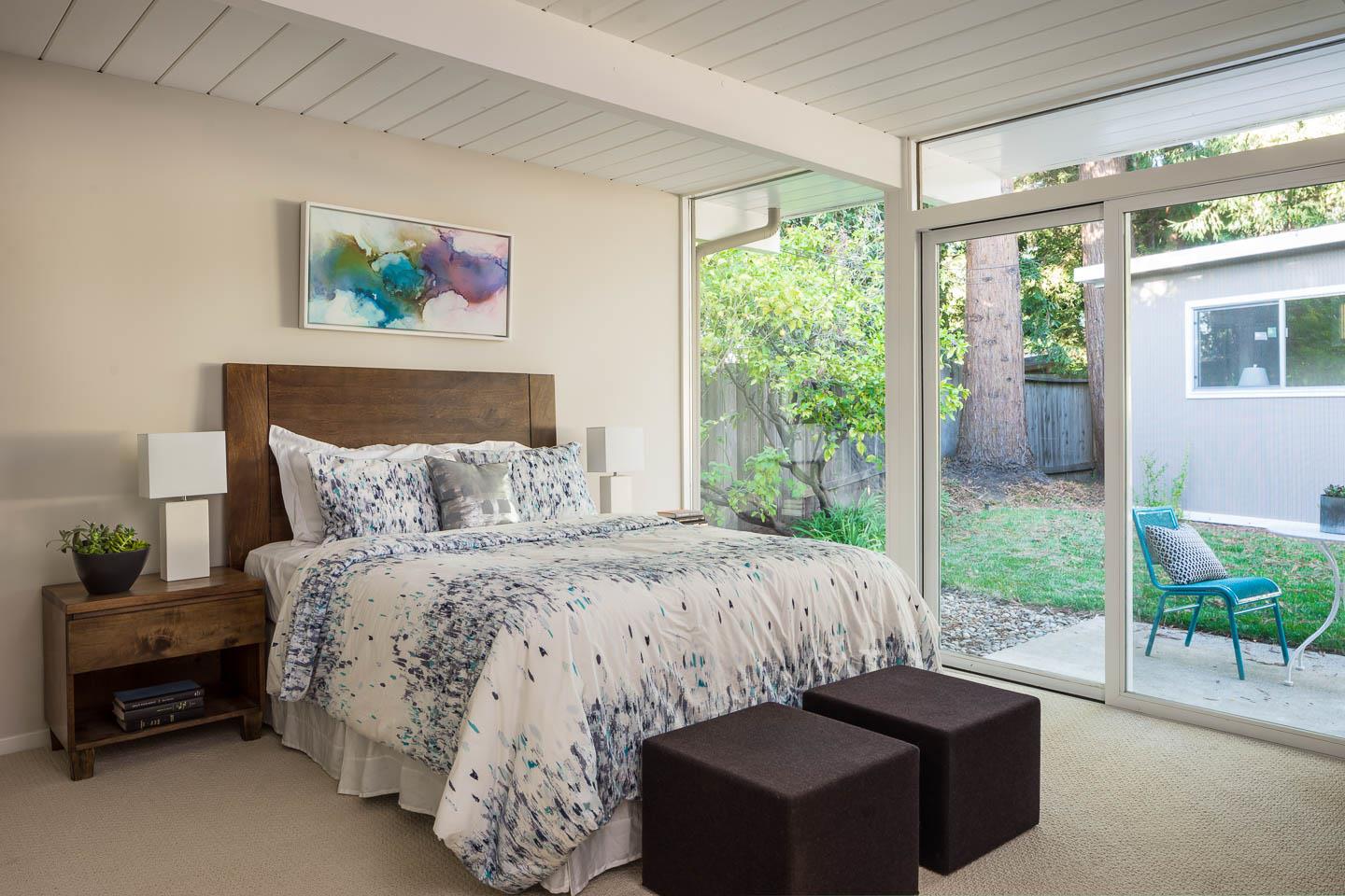 3441 Thomas Drive Palo Alto, CA 94303 - Photo 7 of 14 a bedroom with a bed and a large window