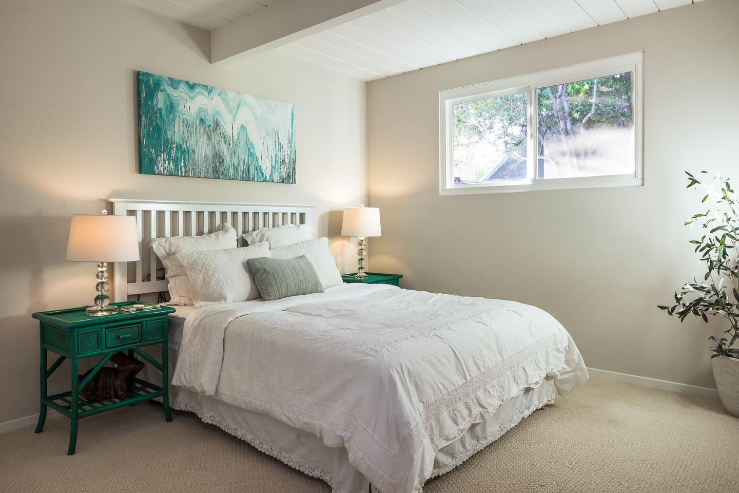 3441 Thomas Drive Palo Alto, CA 94303 - Photo 9 of 14 a bedroom with a bed and a table