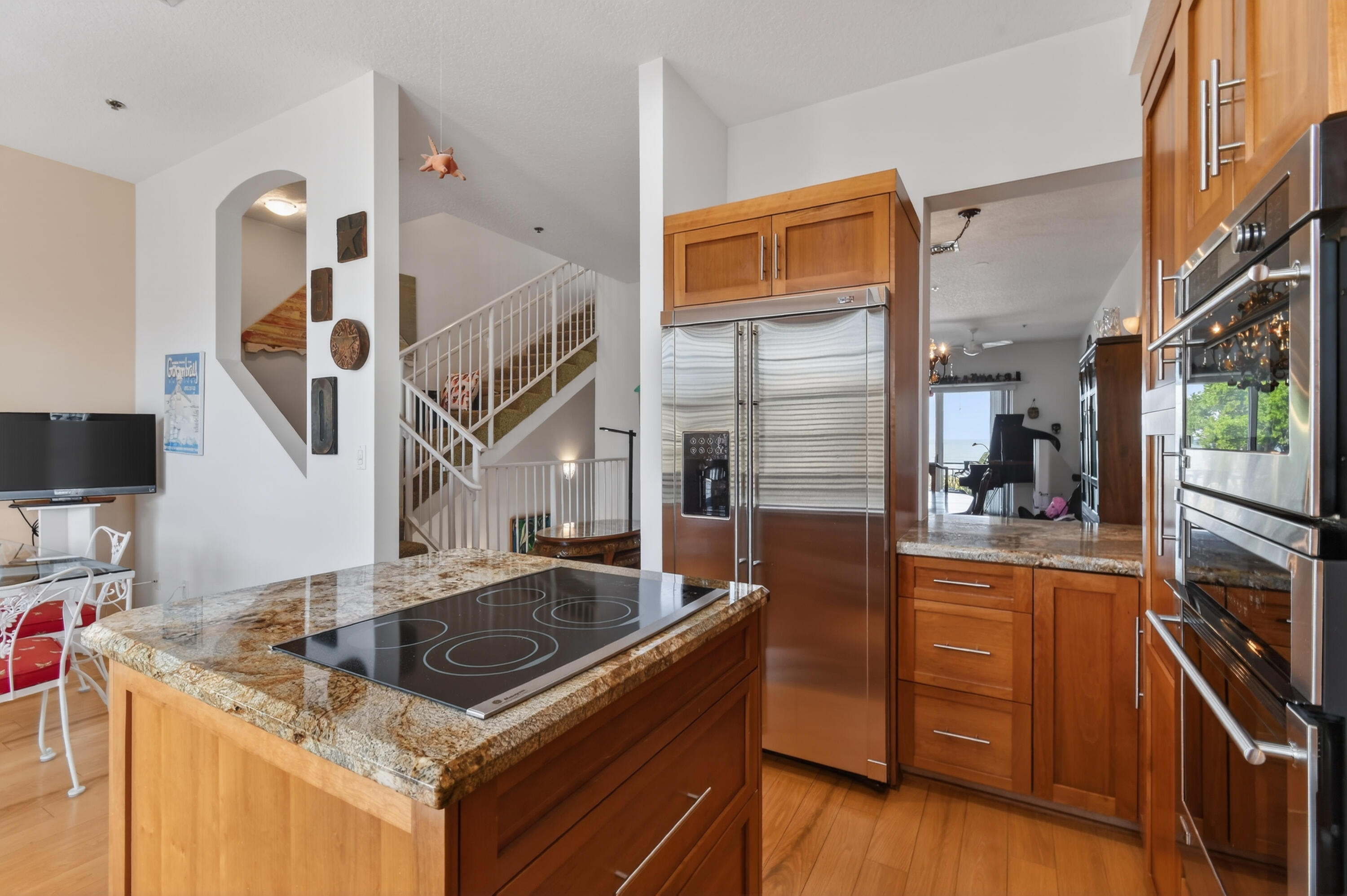 115 Ocean Key Way Jupiter, FL 33477 - Photo 12 of 45 a kitchen that has a sink and a stove