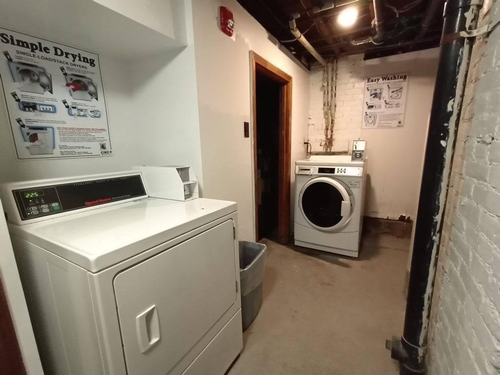 11 Unity Street, Unit 6 Boston, MA 02113 - Photo 9 of 12 a utility room with dryer and washer