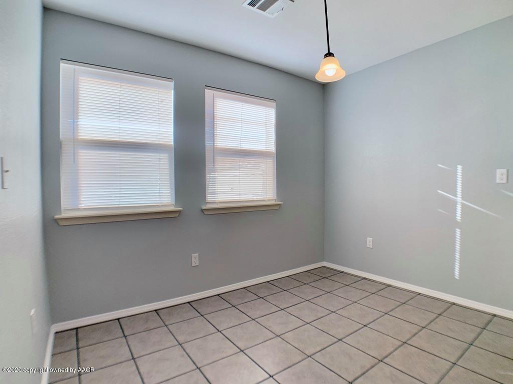 4213 South Harrison Street Amarillo, TX 79110 - Photo 7 of 14 an empty room with windows
