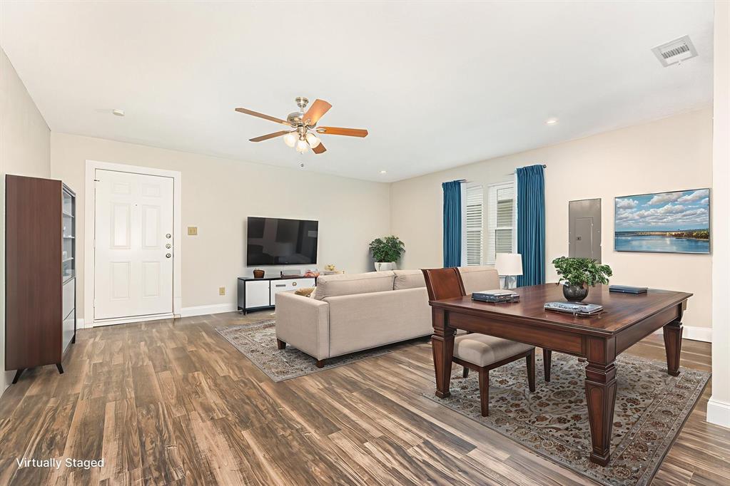 229 South Heartz Road Coppell, TX 75019 - Photo 5 of 18 Virtually staged-Living room with a ceiling fan, dark wood finished floors, electric panel, and recessed lighting